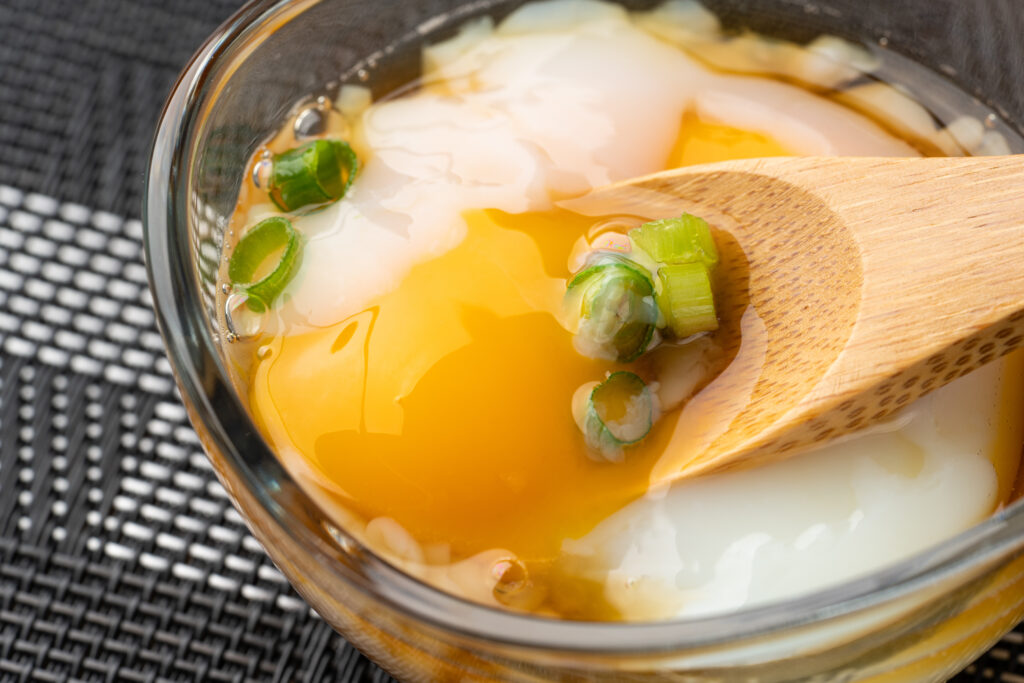 egg slow-boiled so that the yolk is hard but the white is soft (traditionally cooked in a hot spring)